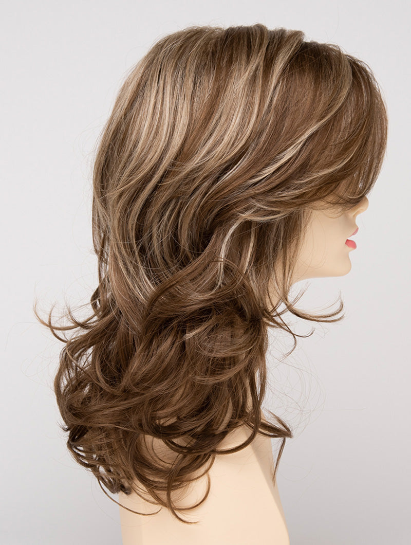 profile side of a long Kinner Beauty Wigs wig for woman on mannequin head