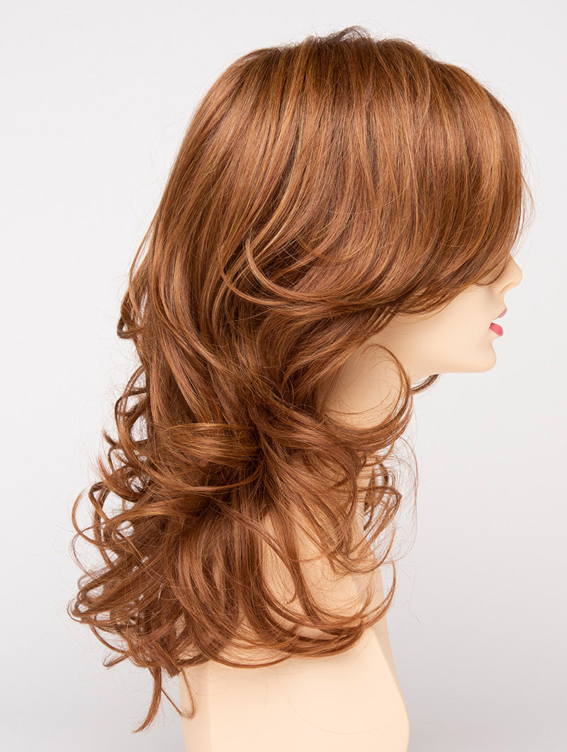 profile side of a long Kinner Beauty Wigs wig for woman on mannequin head