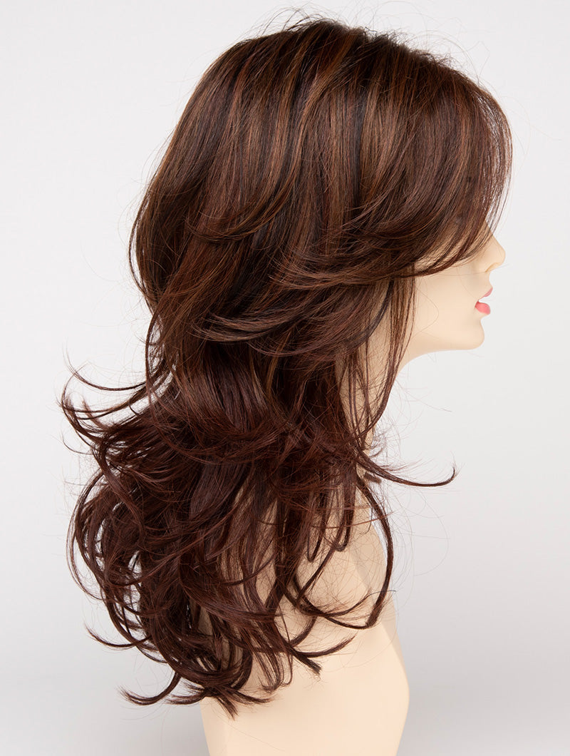 profile side of a long Kinner Beauty Wigs wig for woman on mannequin head