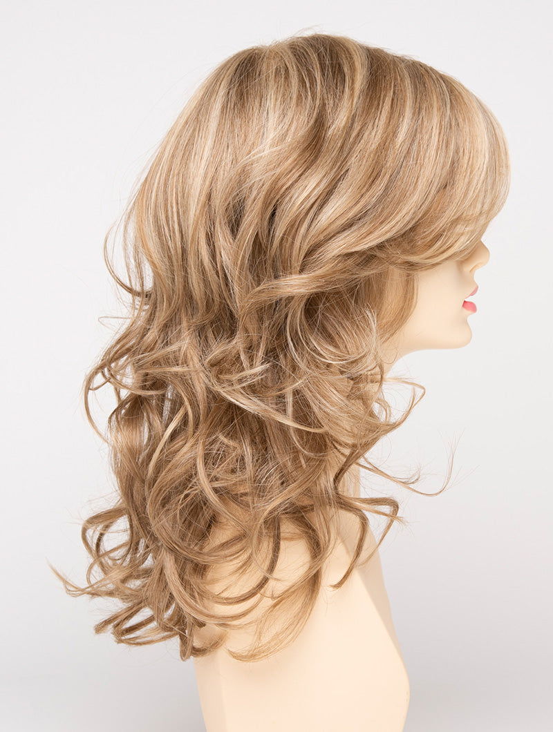 profile side of a long Kinner Beauty Wigs wig for woman on mannequin head