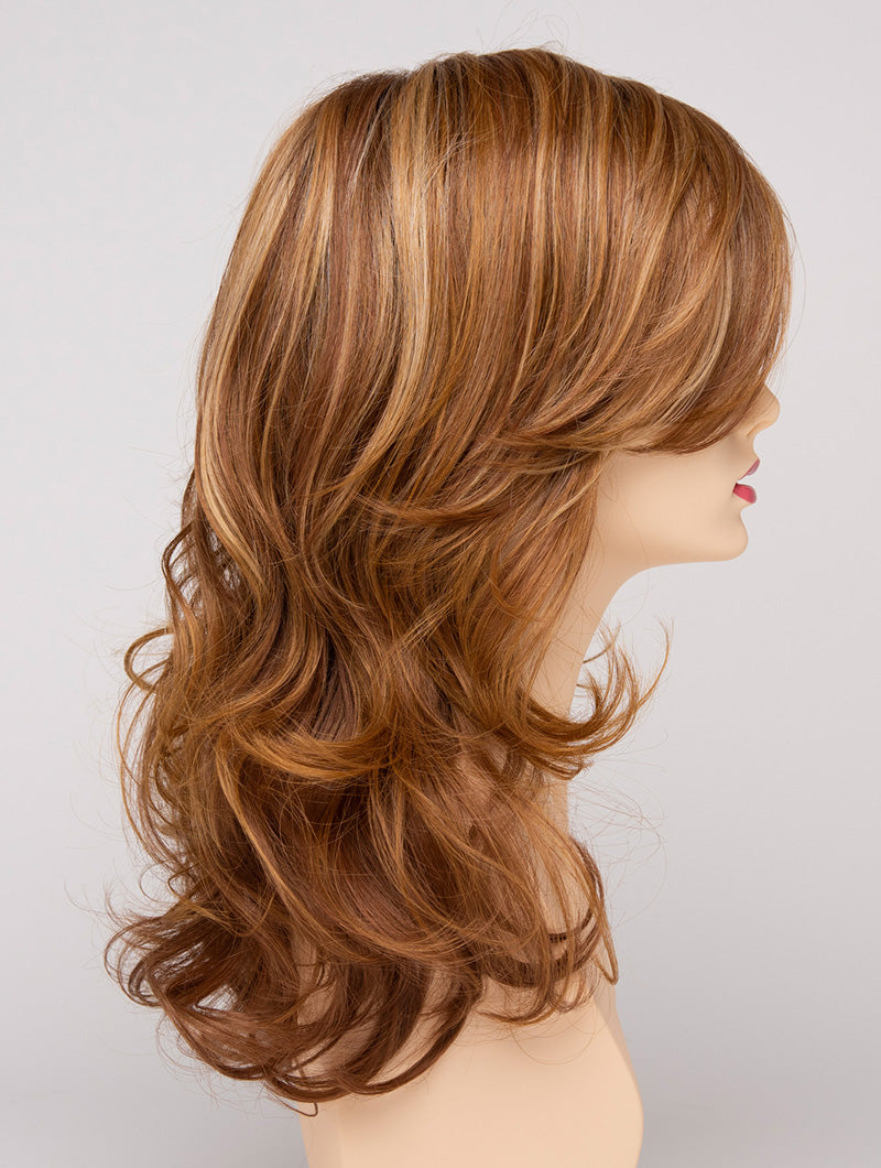 profile side of a long Kinner Beauty Wigs wig for woman on mannequin head