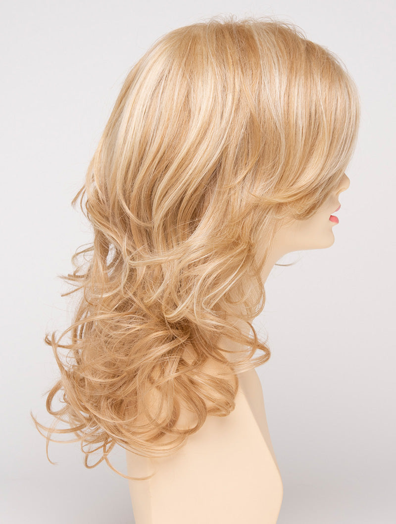 profile side of a long Kinner Beauty Wigs wig for woman on mannequin head