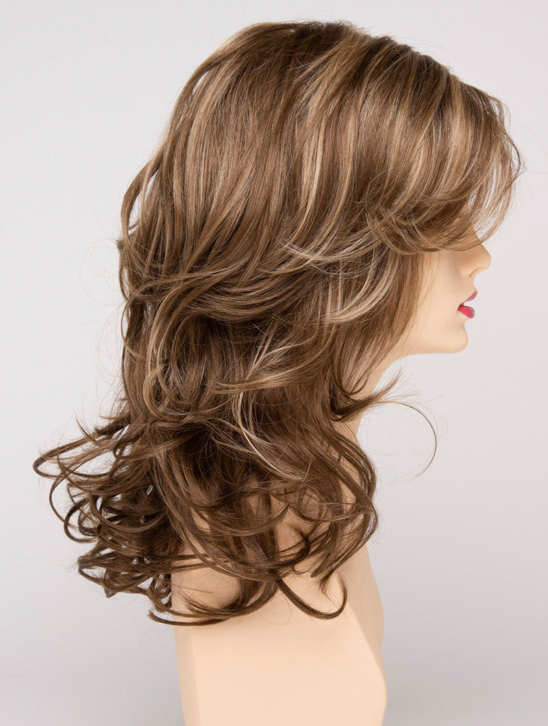 profile side of a long Kinner Beauty Wigs wig for woman on mannequin head