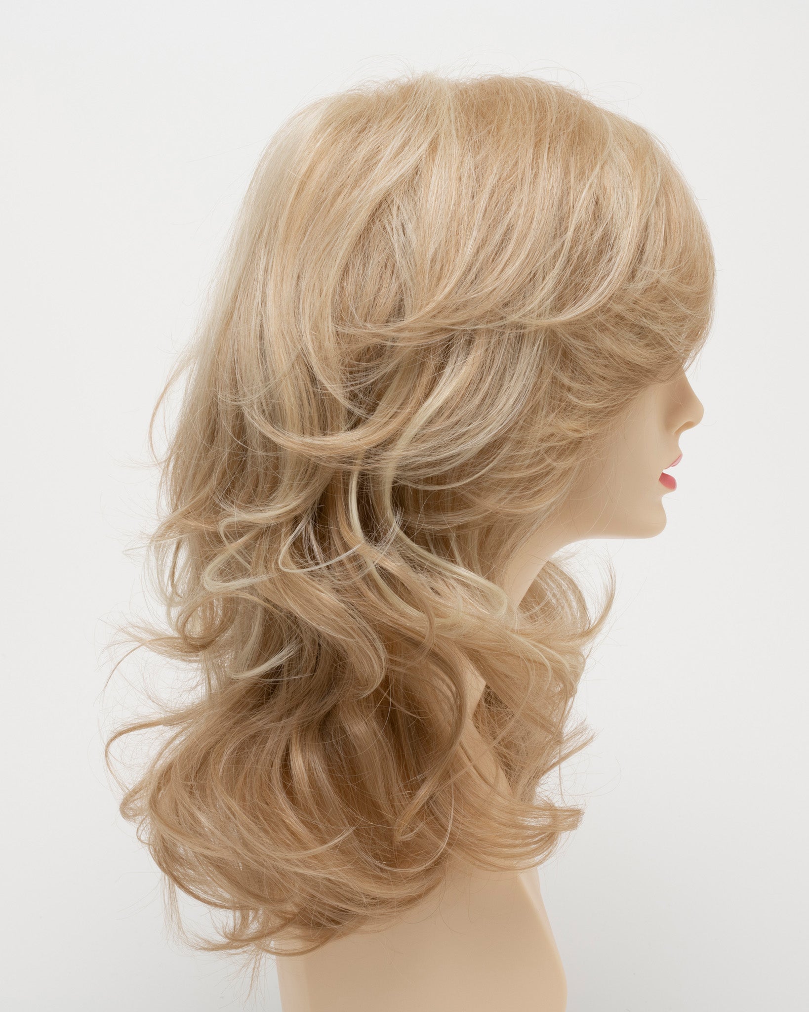 profile side of a long Kinner Beauty Wigs wig for woman on mannequin head