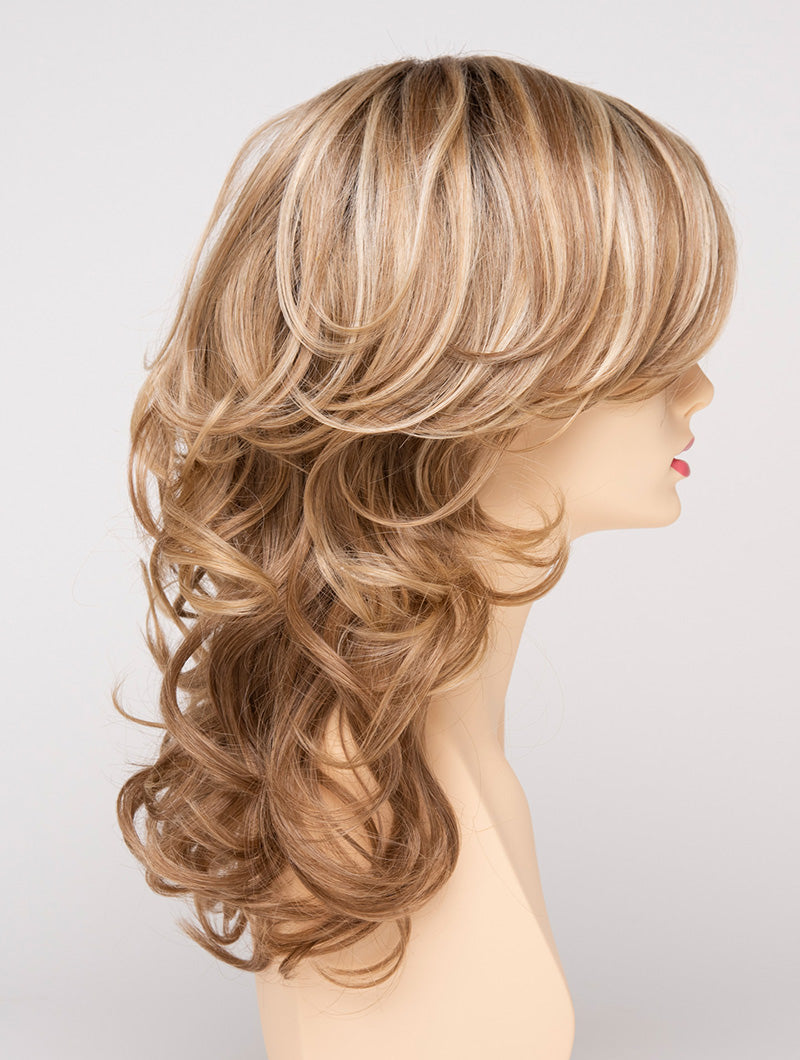 profile side of a long Kinner Beauty Wigs wig for woman on mannequin head