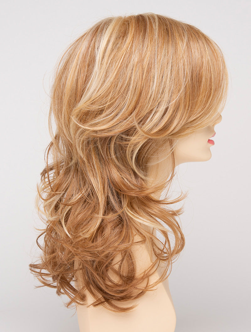 profile side of a long Kinner Beauty Wigs wig for woman on mannequin head