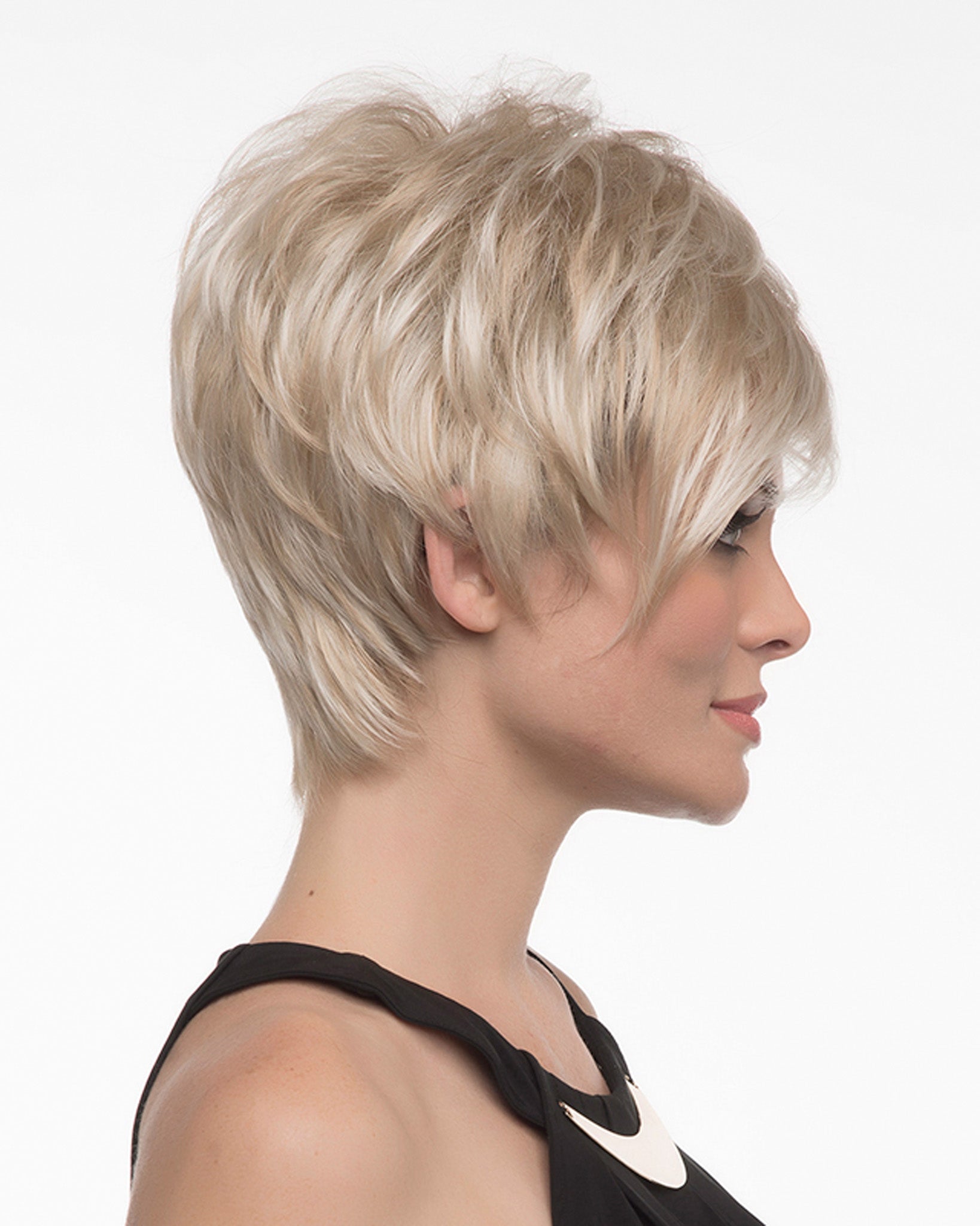 profile side of a short Kinner Beauty Wigs wig on woman head