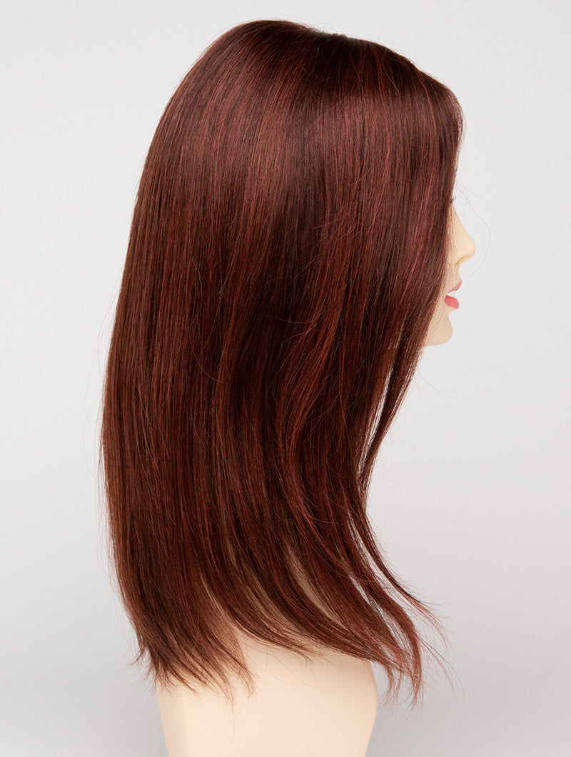 profile side of a long Kinner Beauty Wigs wig for woman on mannequin head