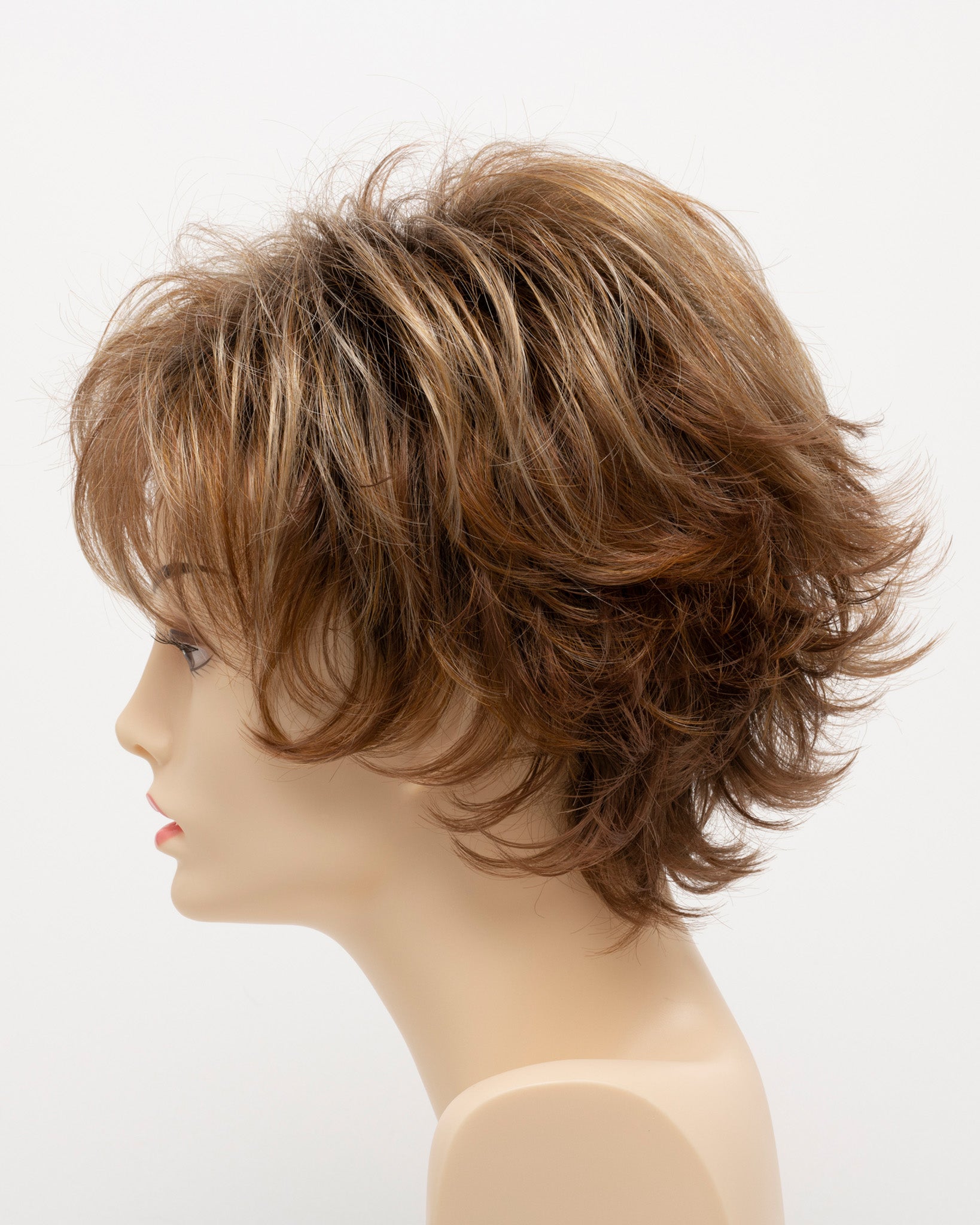 profile side of a short Kinner Beauty Wigs wig on woman head