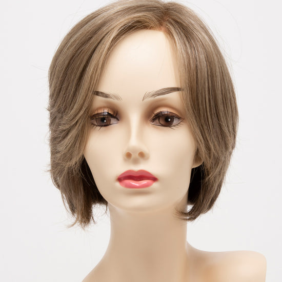 front side of a short Kinner Beauty Wigs wig for woman on mannequin head 