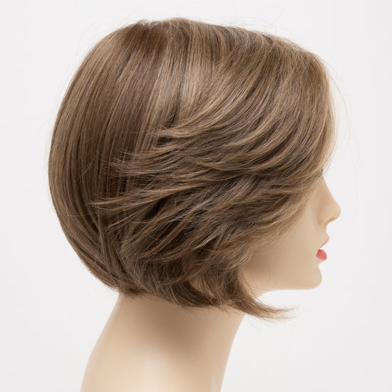 profile side of a short Kinner Beauty Wigs wig for woman on mannequin head 