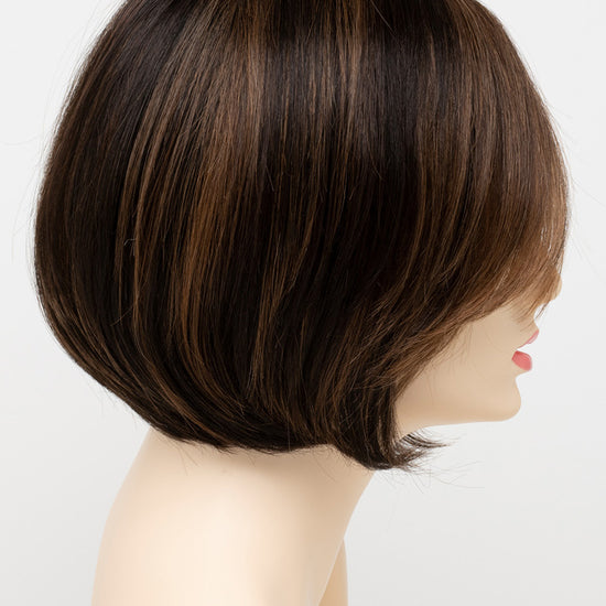 profile side of a short Kinner Beauty Wigs wig for woman on mannequin head 