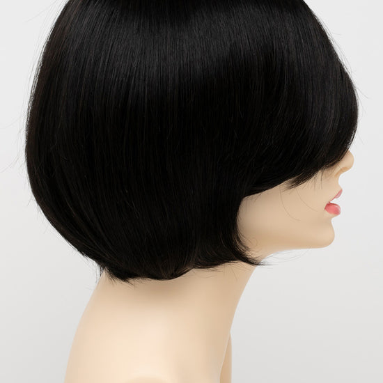 profile side of a short Kinner Beauty Wigs wig for woman on mannequin head 