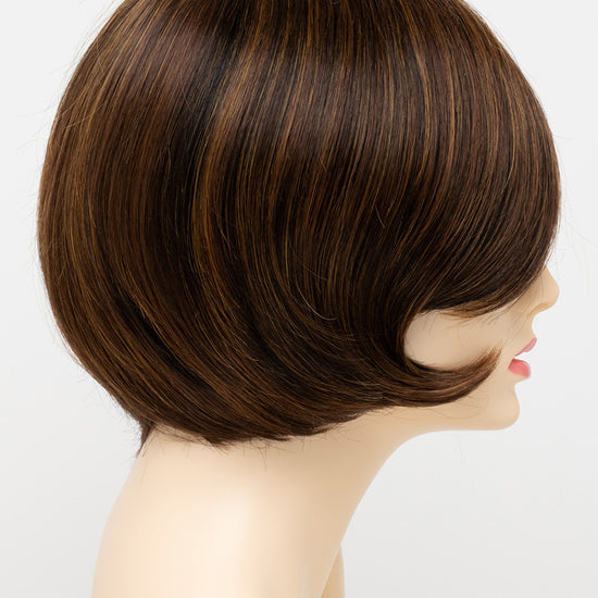 profile side of a short Kinner Beauty Wigs wig for woman on mannequin head 