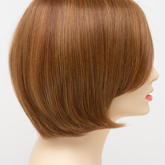 profile side of a short Kinner Beauty Wigs wig for woman on mannequin head 