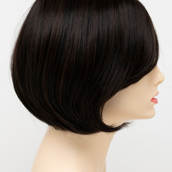 profile side of a short Kinner Beauty Wigs wig for woman on mannequin head 