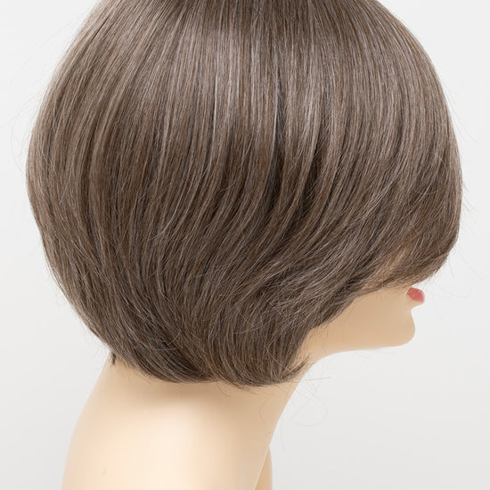 profile side of a short Kinner Beauty Wigs wig for woman on mannequin head 