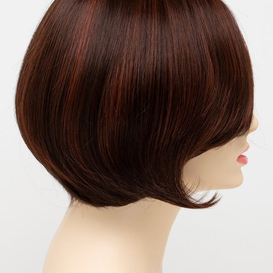 profile side of a short Kinner Beauty Wigs wig for woman on mannequin head 