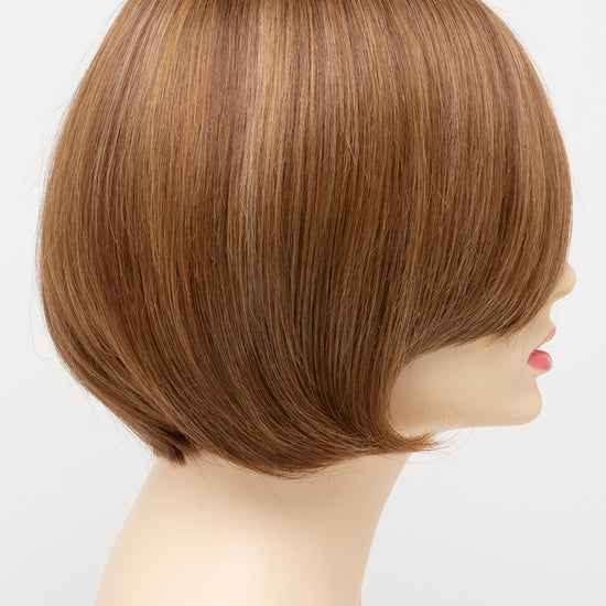 profile side of a short Kinner Beauty Wigs wig for woman on mannequin head 