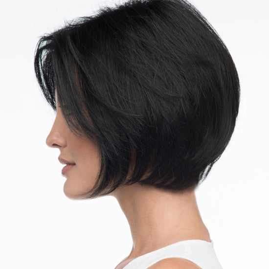 profile side of a short Kinner Beauty Wigs wig on woman head 