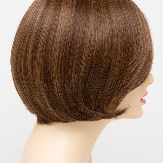 profile side of a short Kinner Beauty Wigs wig for woman on mannequin head 