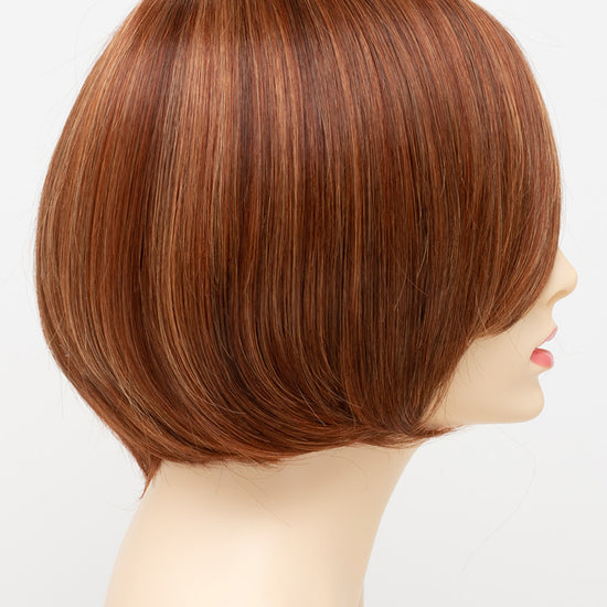 profile side of a short Kinner Beauty Wigs wig for woman on mannequin head 