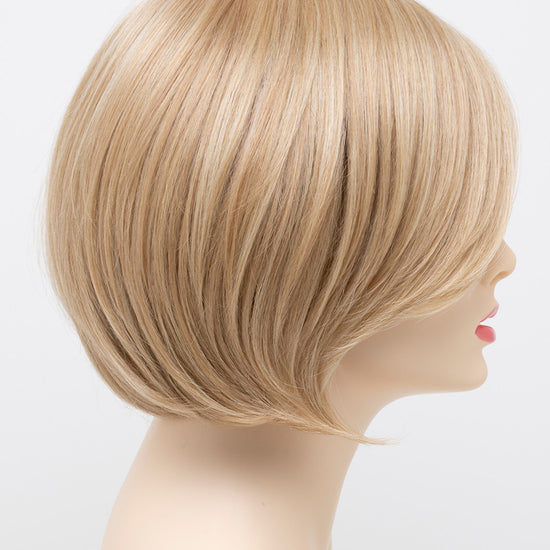 profile side of a short Kinner Beauty Wigs wig for woman on mannequin head 