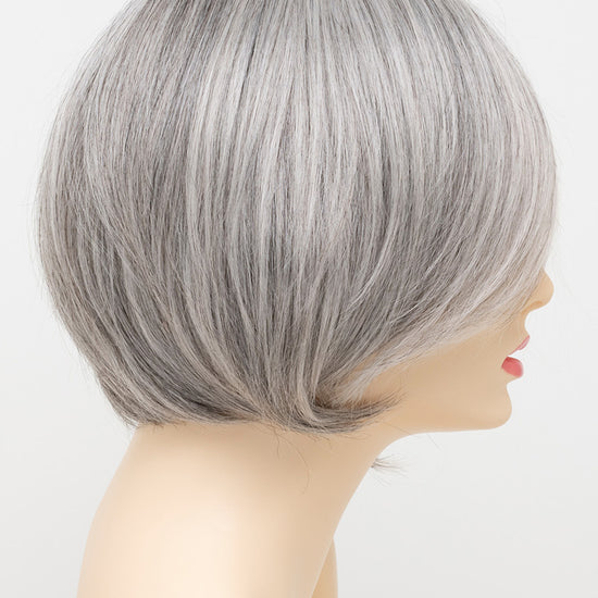 profile side of a short Kinner Beauty Wigs wig for woman on mannequin head 