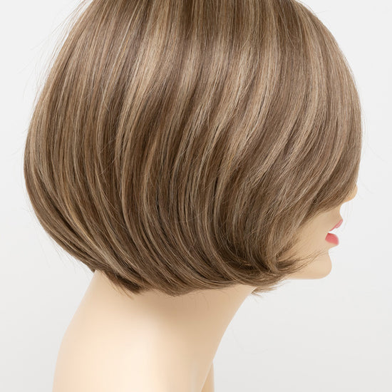 profile side of a short Kinner Beauty Wigs wig for woman on mannequin head 