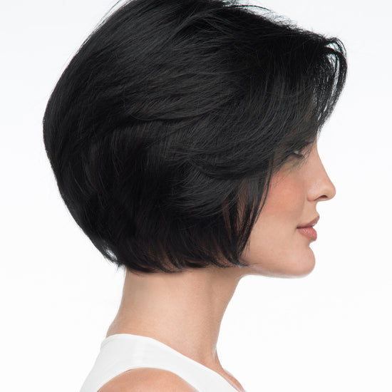 profile side of a short Kinner Beauty Wigs wig on woman head 