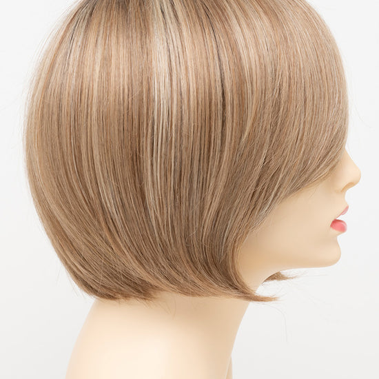 profile side of a short Kinner Beauty Wigs wig for woman on mannequin head 