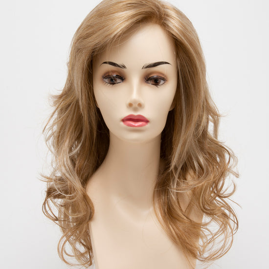 front side of a long Kinner Beauty Wigs wig for woman on mannequin head 