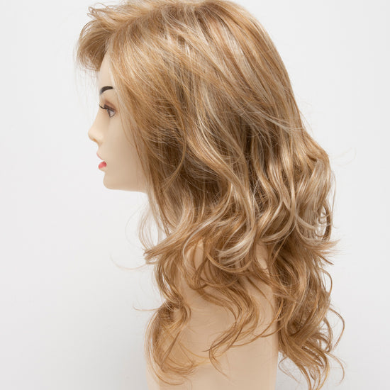 profile side of a long Kinner Beauty Wigs wig for woman on mannequin head 