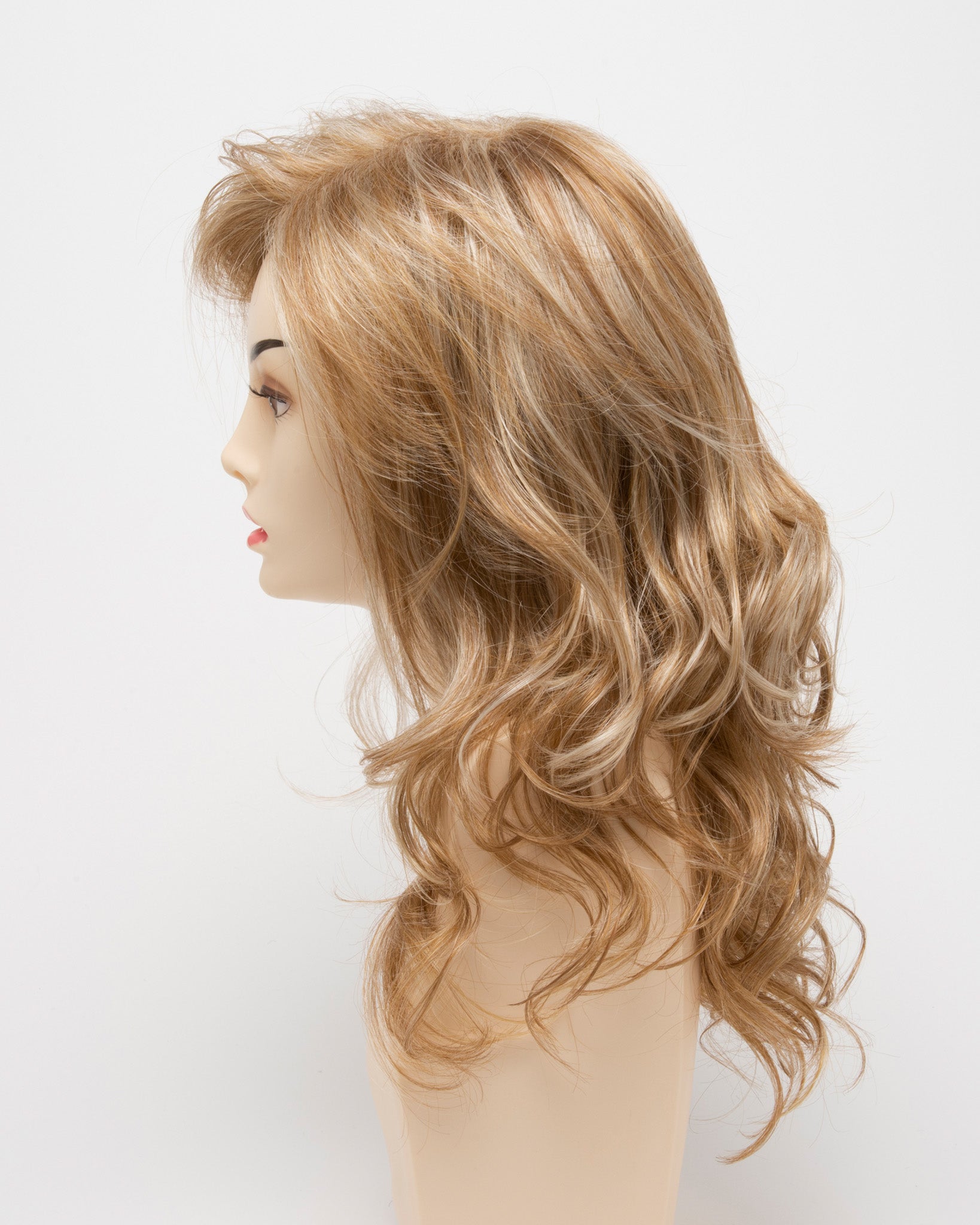 profile side of a long Kinner Beauty Wigs wig for woman on mannequin head 