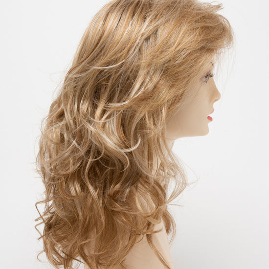 profile side of a long Kinner Beauty Wigs wig for woman on mannequin head 