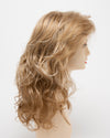 profile side of a long Kinner Beauty Wigs wig for woman on mannequin head 