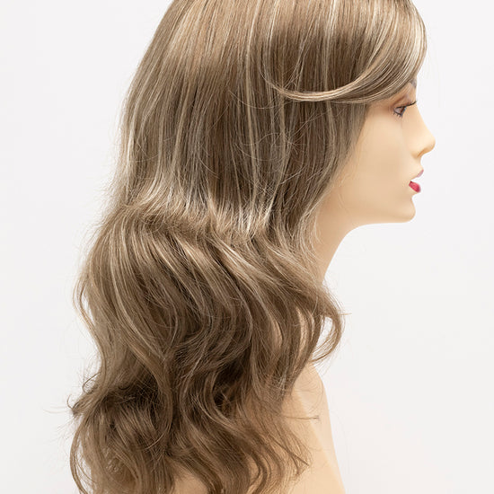 profile side of a long Kinner Beauty Wigs wig for woman on mannequin head 