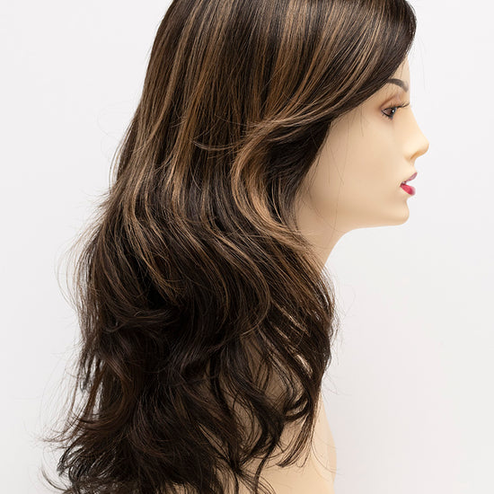 profile side of a long Kinner Beauty Wigs wig for woman on mannequin head 