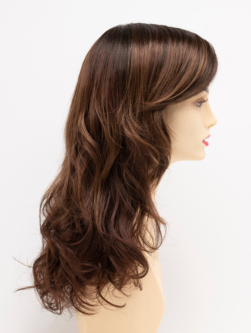 profile side of a long Kinner Beauty Wigs wig for woman on mannequin head 