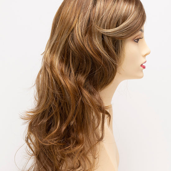 profile side of a long Kinner Beauty Wigs wig for woman on mannequin head 