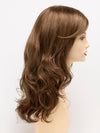 profile side of a long Kinner Beauty Wigs wig for woman on mannequin head 