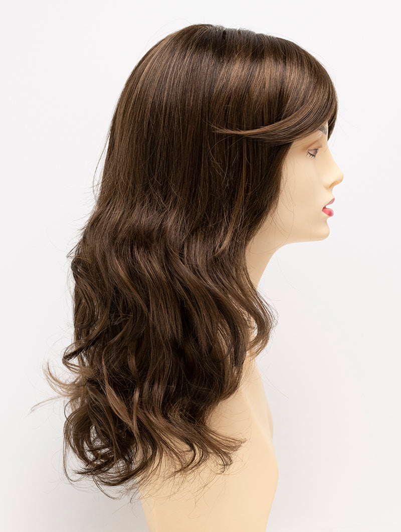 profile side of a long Kinner Beauty Wigs wig for woman on mannequin head 