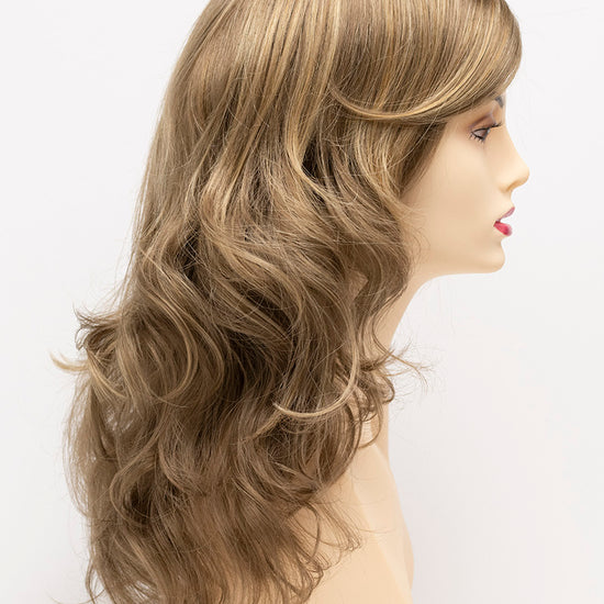 profile side of a long Kinner Beauty Wigs wig for woman on mannequin head 