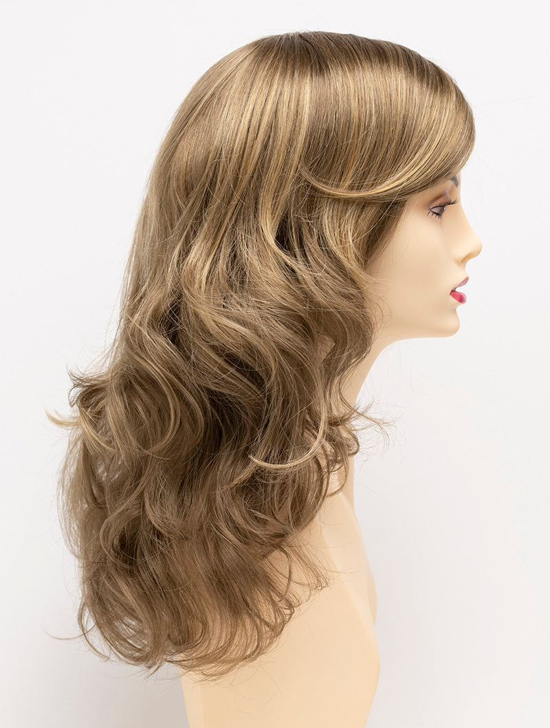 profile side of a long Kinner Beauty Wigs wig for woman on mannequin head 