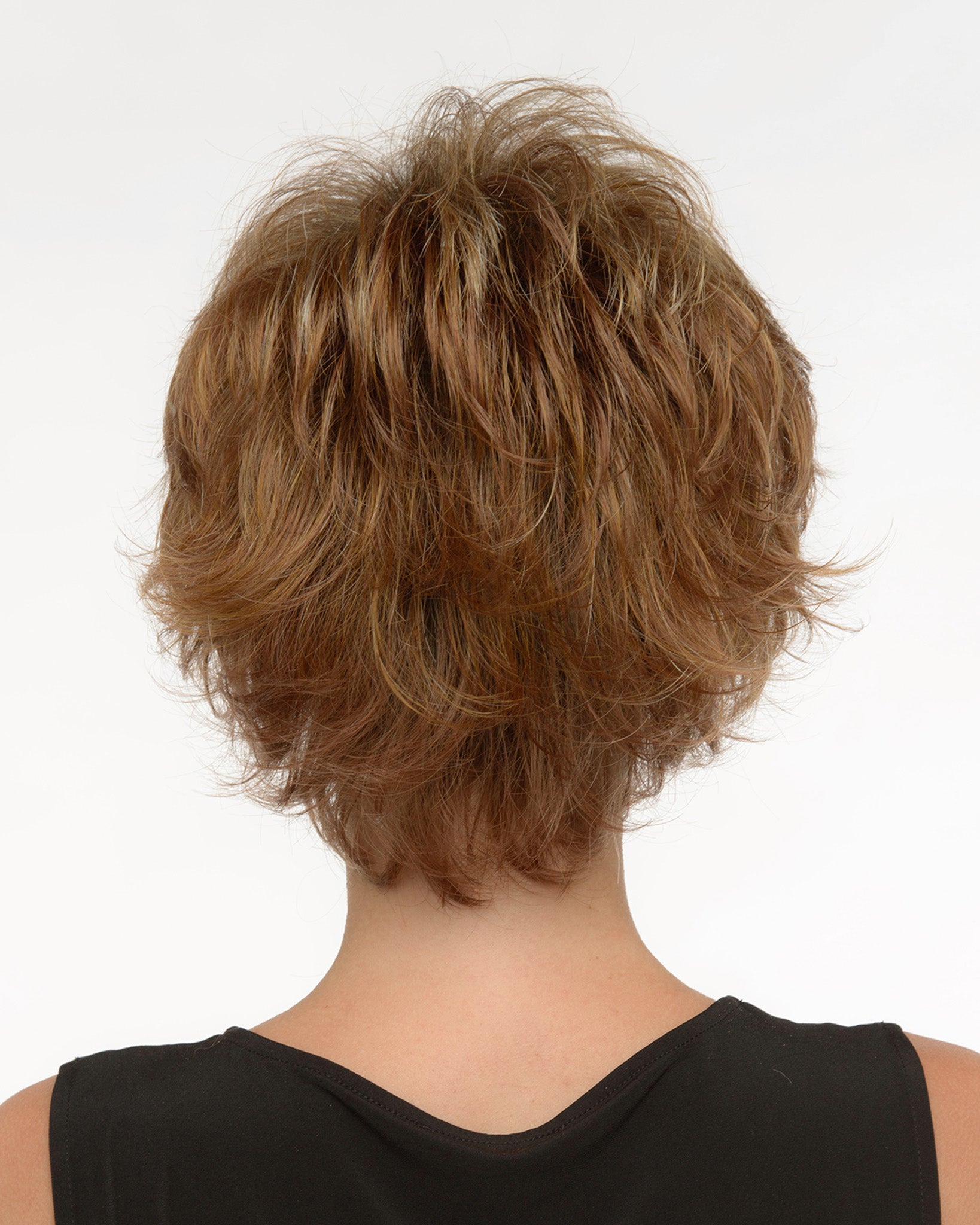 back side of a short Kinner Beauty Wigs wig on woman head 