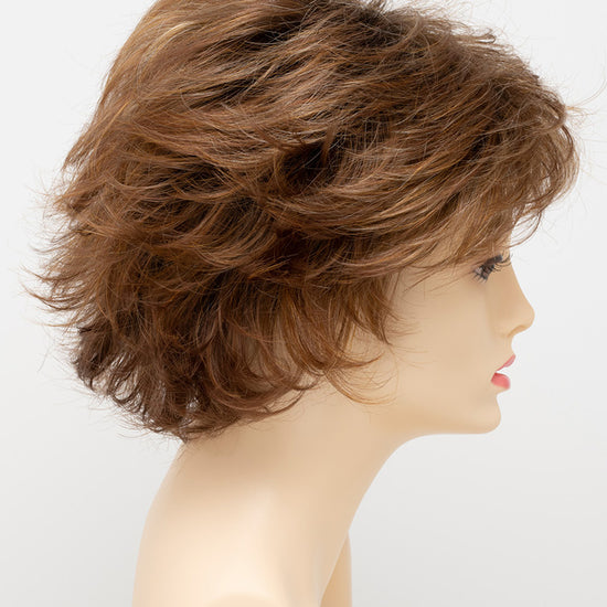 profile side of a short Kinner Beauty Wigs wig for woman on mannequin head 