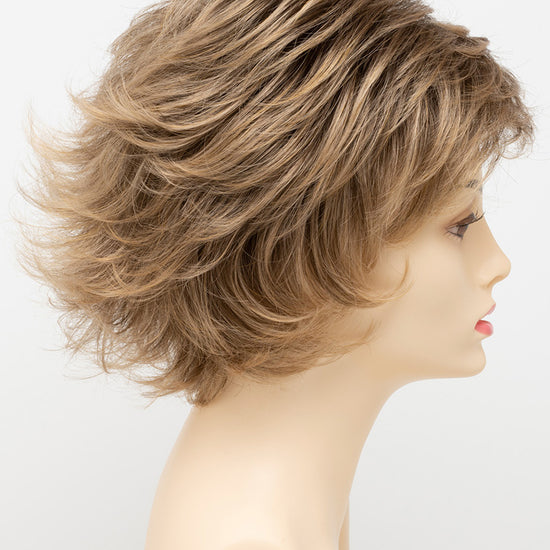 profile side of a short Kinner Beauty Wigs wig for woman on mannequin head 