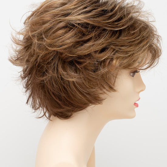 profile side of a short Kinner Beauty Wigs wig for woman on mannequin head 