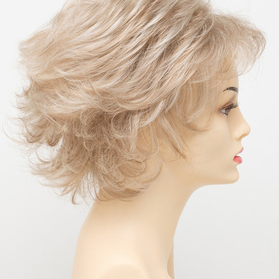 profile side of a short Kinner Beauty Wigs wig for woman on mannequin head 