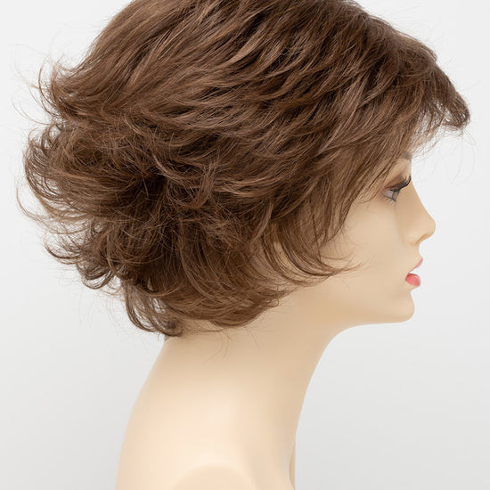 profile side of a short Kinner Beauty Wigs wig for woman on mannequin head 